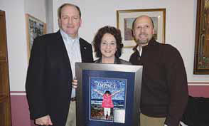 Make-A-Wish Wisconsin presents the foundation's annual recognition plaque to Rodney Rushing of Johnson Controls